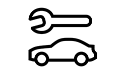Schraubenschlüssel über einem Fahrzeug als Symbol für passgenaue BMW Teile.