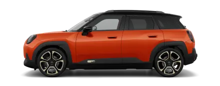 Ein MINI Aceman oder Countryman-Modell in leuchtendem Orange mit schwarzem Dach und robust wirkenden Felgen im Fünf-Speichen-Design.